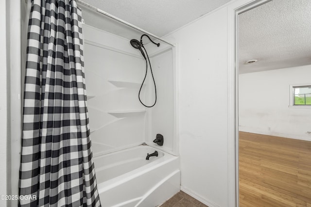 645 Worth St, Granby, MO 64844 - full bathroom with a textured ceiling and shower / bath combo with shower curtain