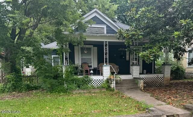 215 N Byers Ave, Joplin, MO 64801 - bungalow-style home featuring a porch