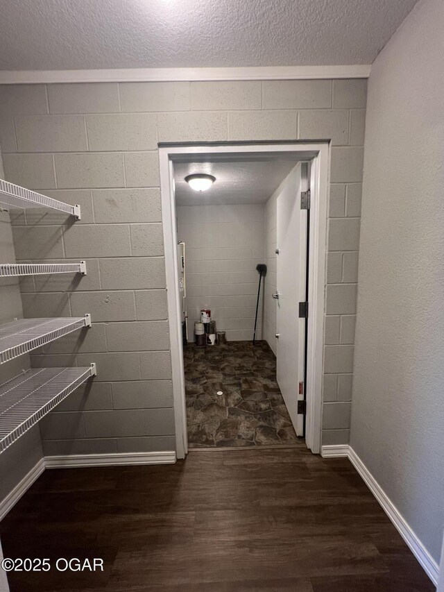 2124 S Byers Ave, Joplin, MO 64804 - corridor with wood finished floors and a textured ceiling