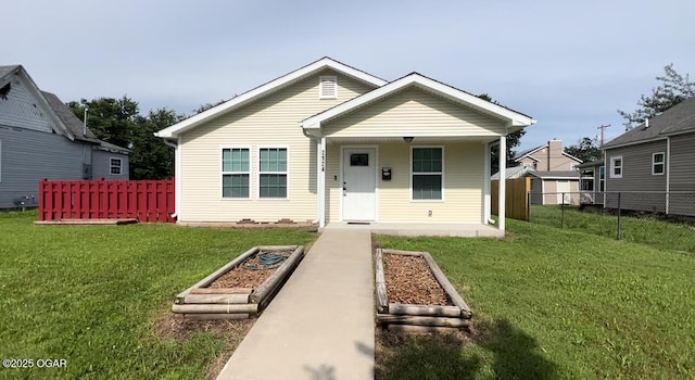 2124 S Byers Ave, Joplin, MO 64804 - bungalow featuring a vegetable garden and a porch