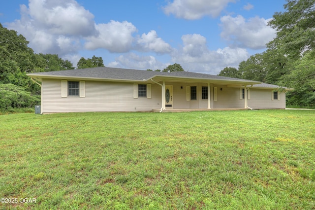 6181 County Lane 306, Carl Junction, MO 64834 - back of house with a lawn