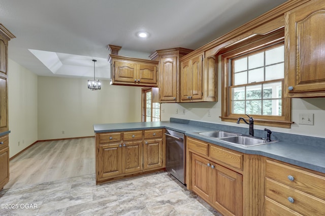 6181 County Lane 306, Carl Junction, MO 64834 - kitchen with dishwasher, a peninsula, brown cabinetry, hanging light fixtures, and a chandelier