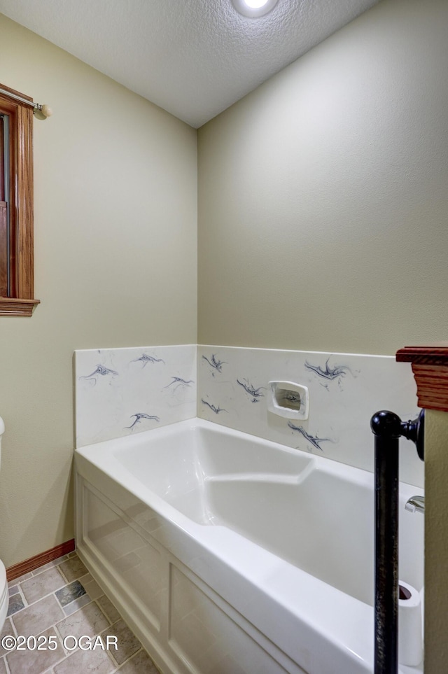 6181 County Lane 306, Carl Junction, MO 64834 - bathroom featuring toilet and a textured ceiling