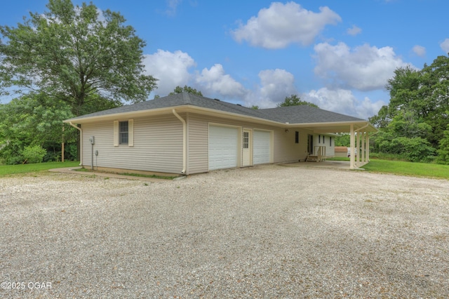 6181 County Lane 306, Carl Junction, MO 64834 - view of front of home featuring a garage and driveway