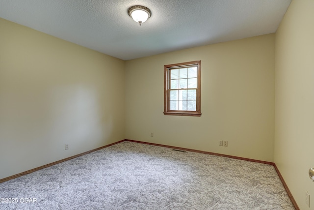 6181 County Lane 306, Carl Junction, MO 64834 - unfurnished room featuring carpet and a textured ceiling