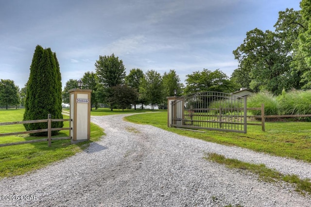 10640 Durango Ln, Carthage, MO 64836 - view of dirt / gravel road featuring a gated entry and a gate