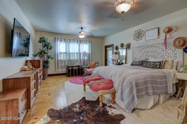 10640 Durango Ln, Carthage, MO 64836 - bedroom with light wood finished floors and a ceiling fan