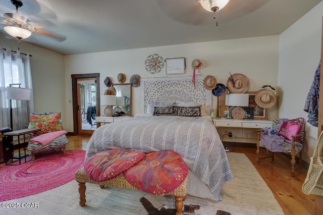 10640 Durango Ln, Carthage, MO 64836 - bedroom featuring wood finished floors and a ceiling fan