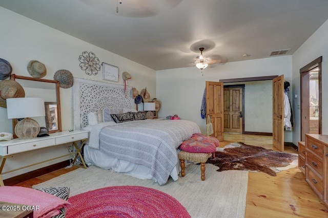 10640 Durango Ln, Carthage, MO 64836 - bedroom featuring light wood-style flooring and ceiling fan