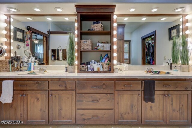 10640 Durango Ln, Carthage, MO 64836 - full bathroom with double vanity, recessed lighting, and tile patterned floors