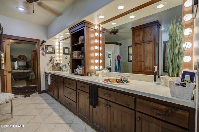 10640 Durango Ln, Carthage, MO 64836 - full bathroom featuring ceiling fan, tile patterned floors, double vanity, and recessed lighting