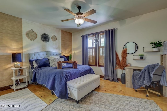 10640 Durango Ln, Carthage, MO 64836 - bedroom with ceiling fan and wood finished floors