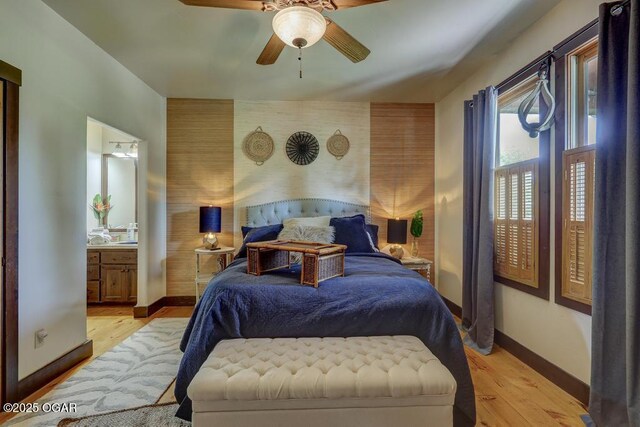 10640 Durango Ln, Carthage, MO 64836 - bedroom featuring light wood-style floors, ensuite bath, and a ceiling fan
