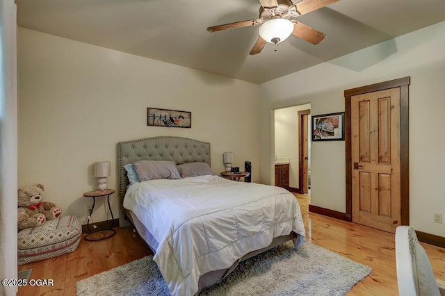 10640 Durango Ln, Carthage, MO 64836 - bedroom with light wood-type flooring, ceiling fan, and ensuite bathroom