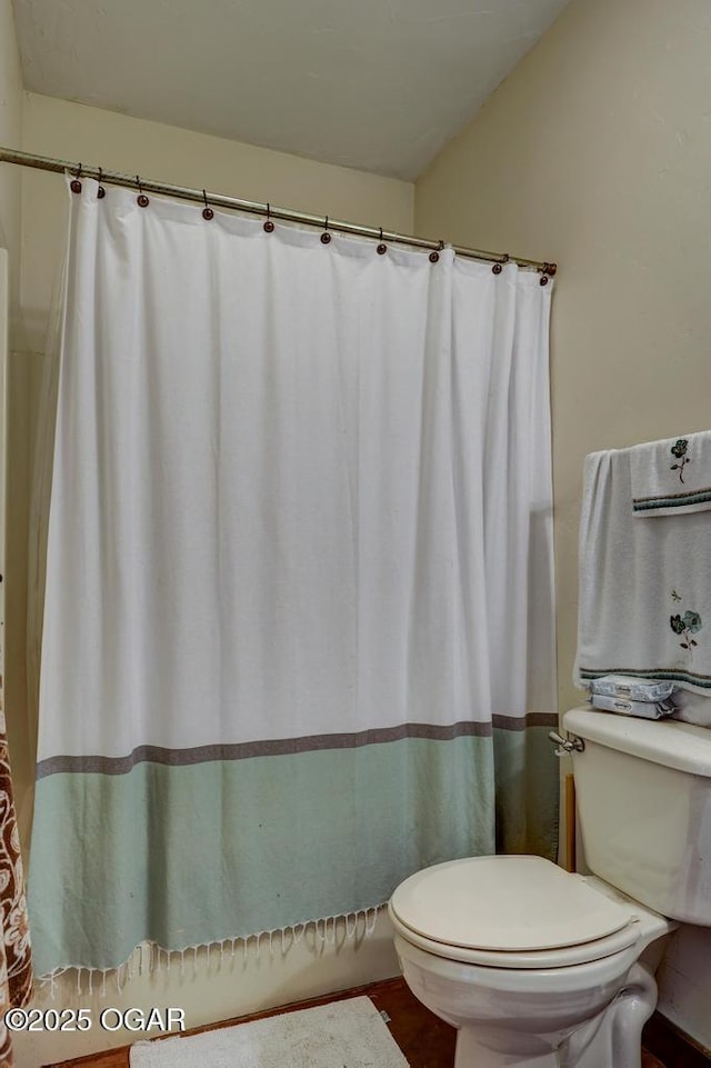 10640 Durango Ln, Carthage, MO 64836 - bathroom with toilet and curtained shower