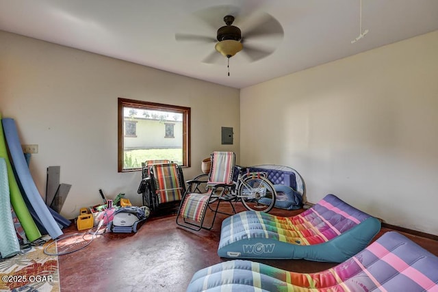 10640 Durango Ln, Carthage, MO 64836 - bedroom with finished concrete flooring, electric panel, and ceiling fan
