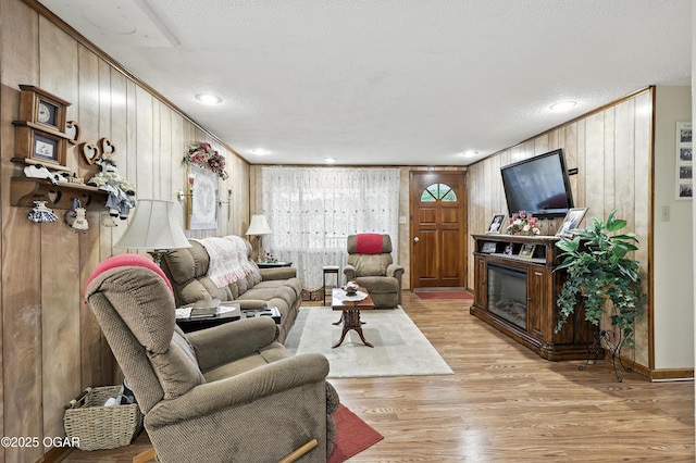 2015 W Zora St, Joplin, MO 64801 - living area featuring light wood-type flooring and wooden walls