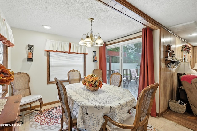 2015 W Zora St, Joplin, MO 64801 - dining room featuring a chandelier, a textured ceiling, and recessed lighting