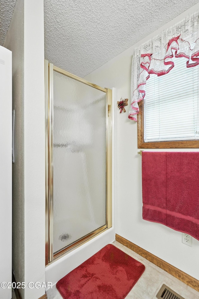 2015 W Zora St, Joplin, MO 64801 - full bathroom with a textured ceiling and a stall shower