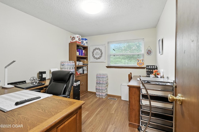 2015 W Zora St, Joplin, MO 64801 - office space with light wood finished floors and a textured ceiling
