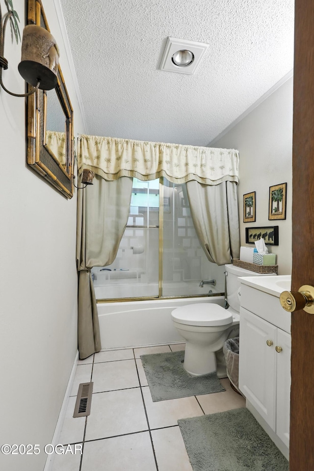 2015 W Zora St, Joplin, MO 64801 - full bath featuring a textured ceiling, vanity, enclosed tub / shower combo, tile patterned floors, and ornamental molding