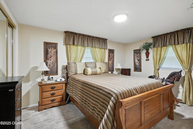 2015 W Zora St, Joplin, MO 64801 - bedroom featuring carpet flooring and multiple windows