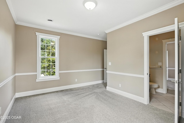 509 W Highland Ave, Carthage, MO 64836 - unfurnished bedroom with carpet, ornamental molding, and connected bathroom