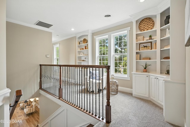 509 W Highland Ave, Carthage, MO 64836 - hall with crown molding, recessed lighting, and an upstairs landing