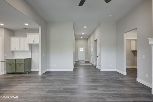 4313 W 28th Pl, Joplin, MO 64804 - unfurnished living room featuring ceiling fan, recessed lighting, and dark wood-style floors