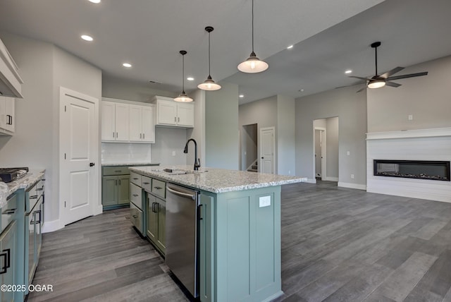 4313 W 28th Pl, Joplin, MO 64804 - kitchen with stainless steel dishwasher, a ceiling fan, white cabinets, dark wood-type flooring, and recessed lighting