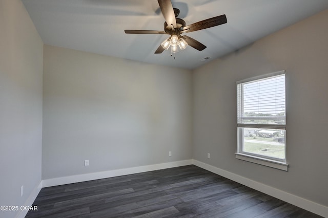 4313 W 28th Pl, Joplin, MO 64804 - spare room featuring dark wood-style flooring and ceiling fan