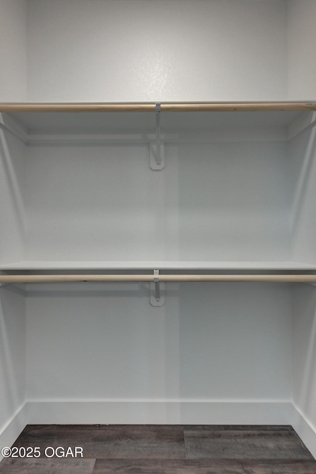 4313 W 28th Pl, Joplin, MO 64804 - walk in closet with dark wood-style floors