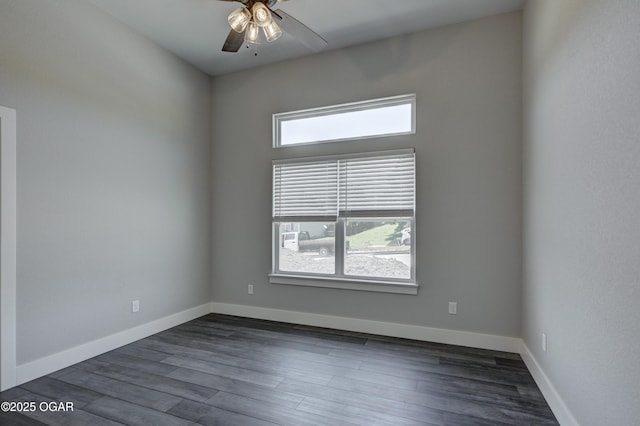 4313 W 28th Pl, Joplin, MO 64804 - unfurnished room featuring a ceiling fan and dark wood-style flooring