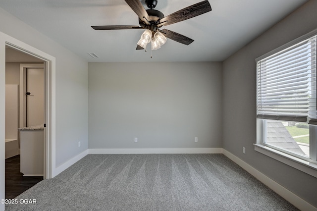 4313 W 28th Pl, Joplin, MO 64804 - empty room with carpet floors and ceiling fan