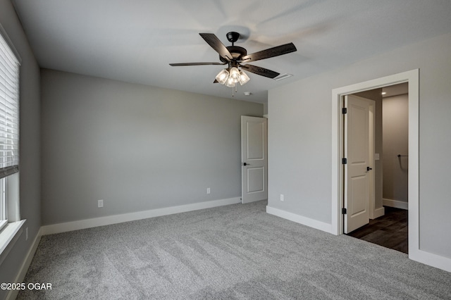 4313 W 28th Pl, Joplin, MO 64804 - unfurnished bedroom with carpet flooring and ceiling fan