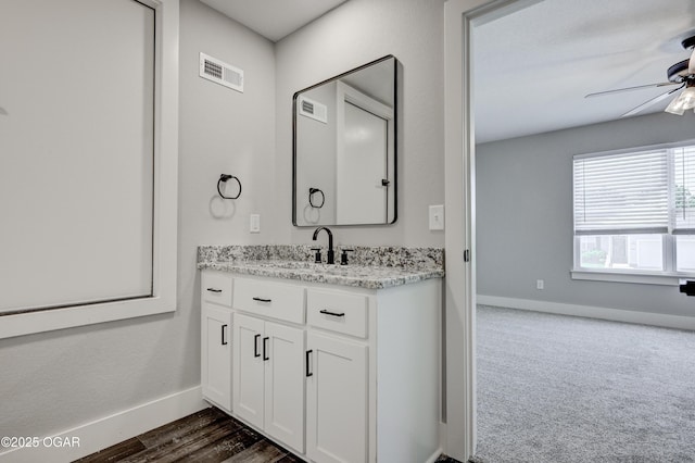 4313 W 28th Pl, Joplin, MO 64804 - bathroom with a ceiling fan and vanity