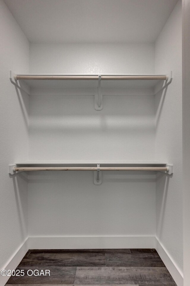 4313 W 28th Pl, Joplin, MO 64804 - spacious closet with dark wood-style flooring