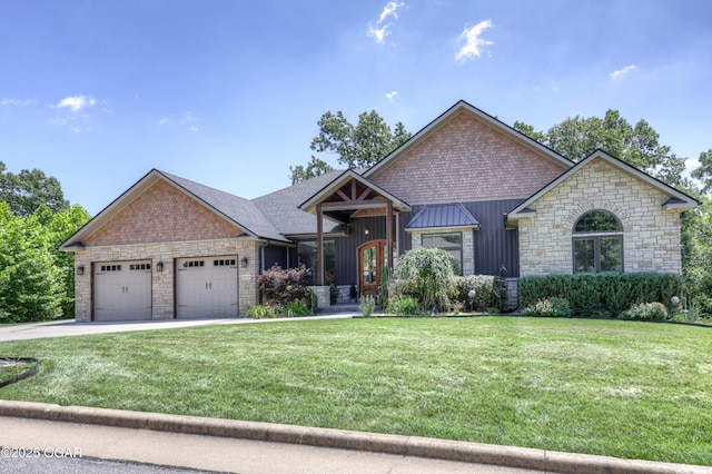 6133 Ridgeview Ct, Joplin, MO 64804 - view of front of home featuring stone siding, a front yard, a garage, and driveway