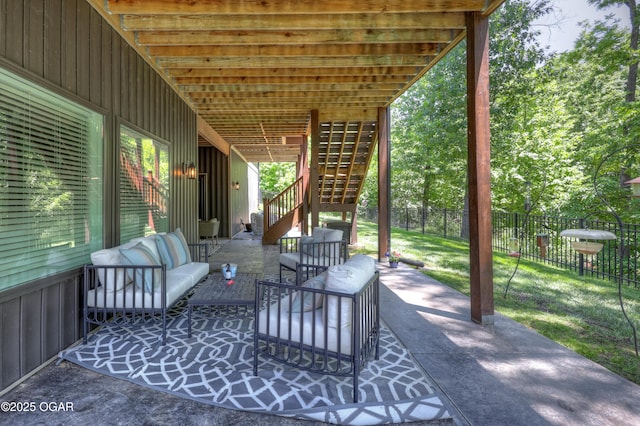 6133 Ridgeview Ct, Joplin, MO 64804 - fenced backyard with stairway, outdoor lounge area, and a patio area