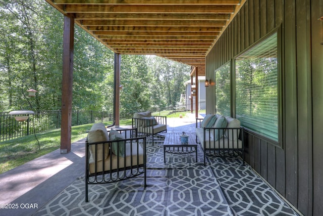 6133 Ridgeview Ct, Joplin, MO 64804 - view of patio / terrace with outdoor lounge area and view of wooded area