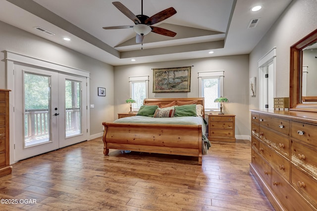 6133 Ridgeview Ct, Joplin, MO 64804 - bedroom featuring french doors, access to outside, light wood-style floors, lofted ceiling, and recessed lighting