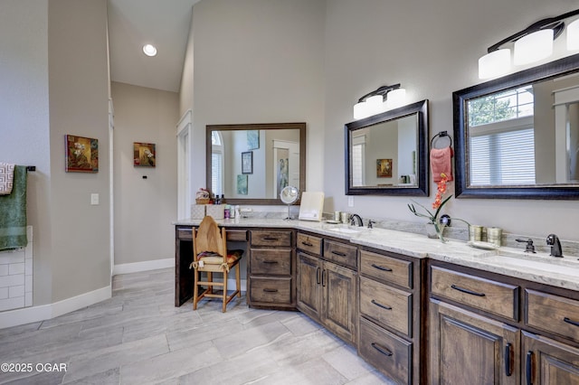 6133 Ridgeview Ct, Joplin, MO 64804 - full bathroom with double vanity and a towering ceiling