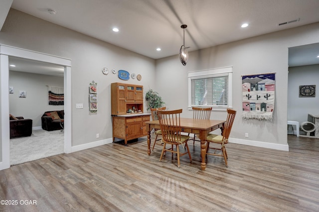 6133 Ridgeview Ct, Joplin, MO 64804 - dining area with light wood-type flooring and recessed lighting