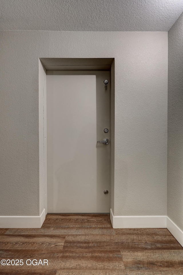 6133 Ridgeview Ct, Joplin, MO 64804 - detailed view of wood finished floors and baseboards