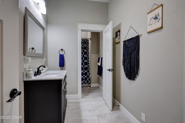 6133 Ridgeview Ct, Joplin, MO 64804 - bathroom featuring vanity and a shower with shower curtain