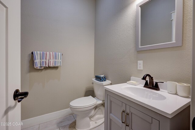 6133 Ridgeview Ct, Joplin, MO 64804 - half bathroom with vanity and tile patterned floors