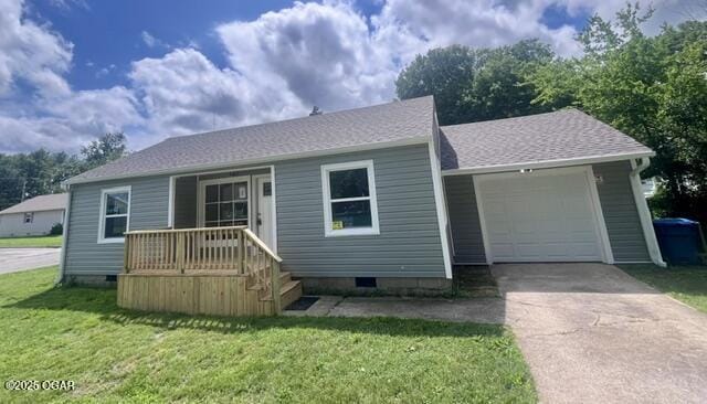 828 S Porter Ave, Joplin, MO 64801 - view of front of property with crawl space, concrete driveway, a front yard, a garage, and roof with shingles