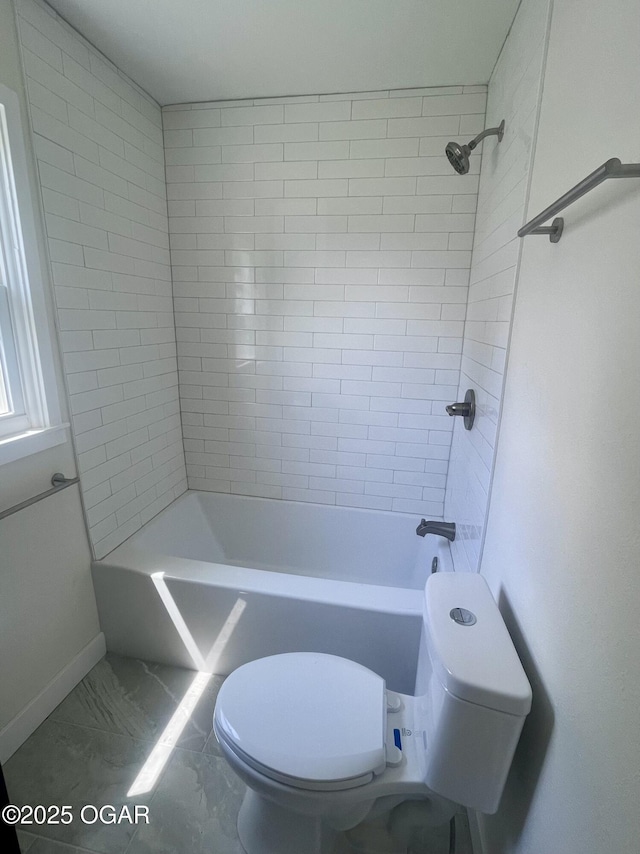 828 S Porter Ave, Joplin, MO 64801 - bathroom with marble look tiles and  shower combination
