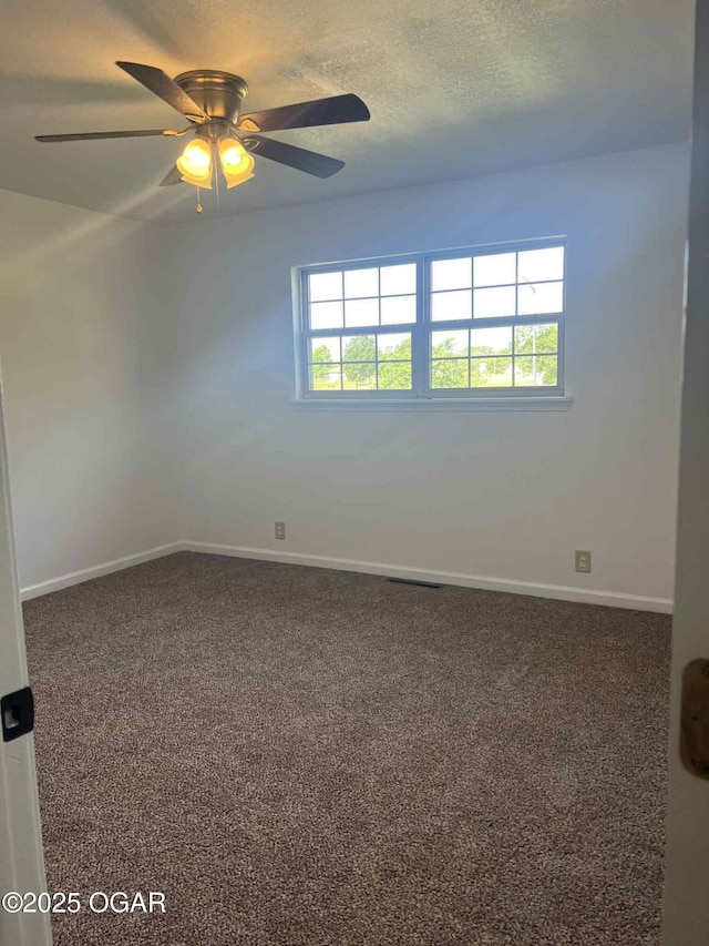 1617 Massachusetts Ave, Joplin, MO 64804 - carpeted spare room with healthy amount of natural light, a ceiling fan, and a textured ceiling