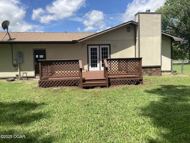 1617 Massachusetts Ave, Joplin, MO 64804 - rear view of house with a chimney, a wooden deck, and french doors